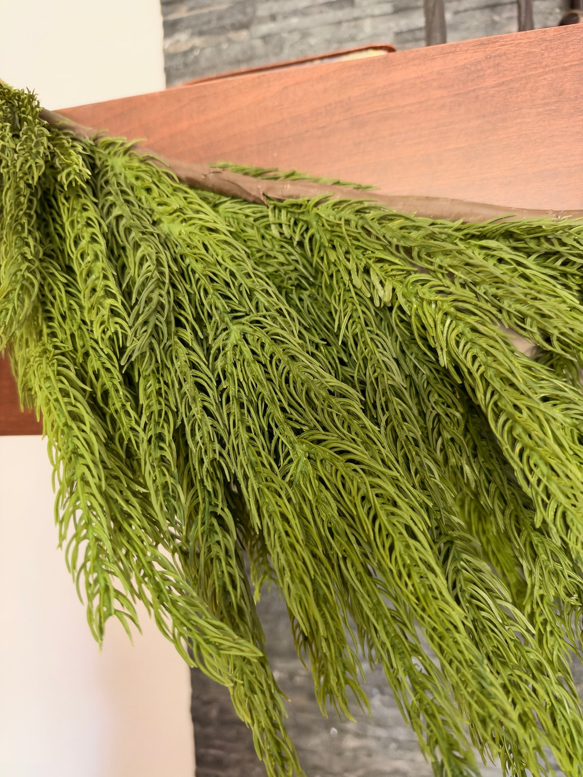 9’ green Norfolk pine garland